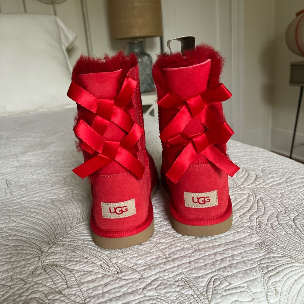Never worn red UGGs from Neiman Marcus.